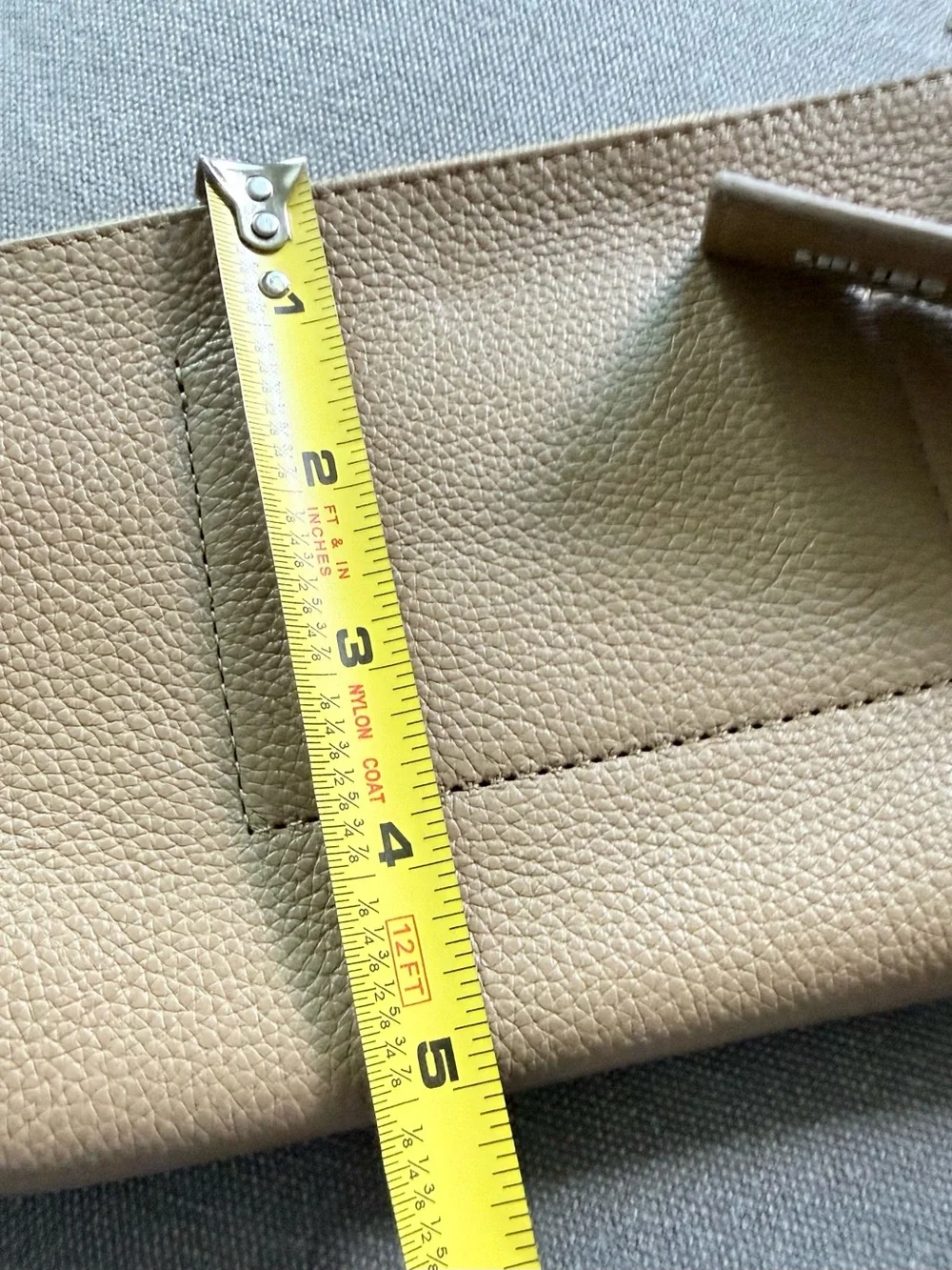 Vince Camuto compact leather